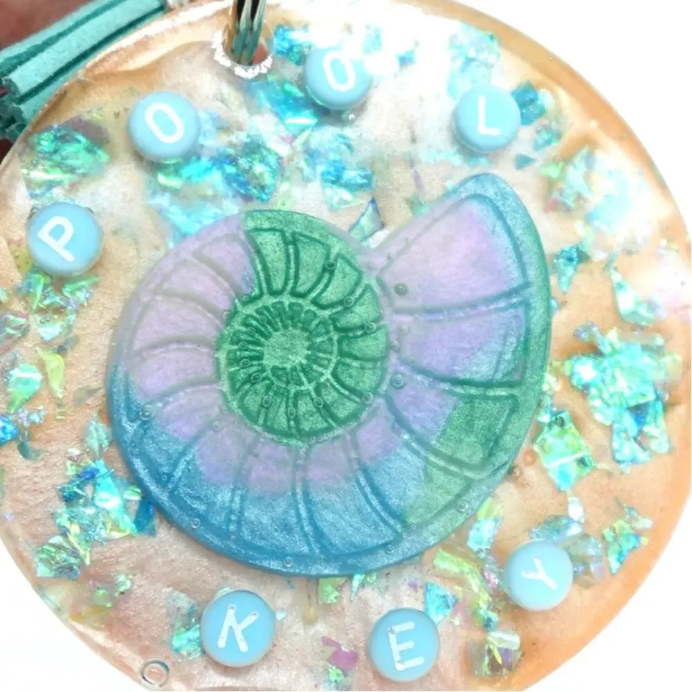 Tropical  Nautilus Shell resin Keychain with teal accents!  POOL KEY Chain